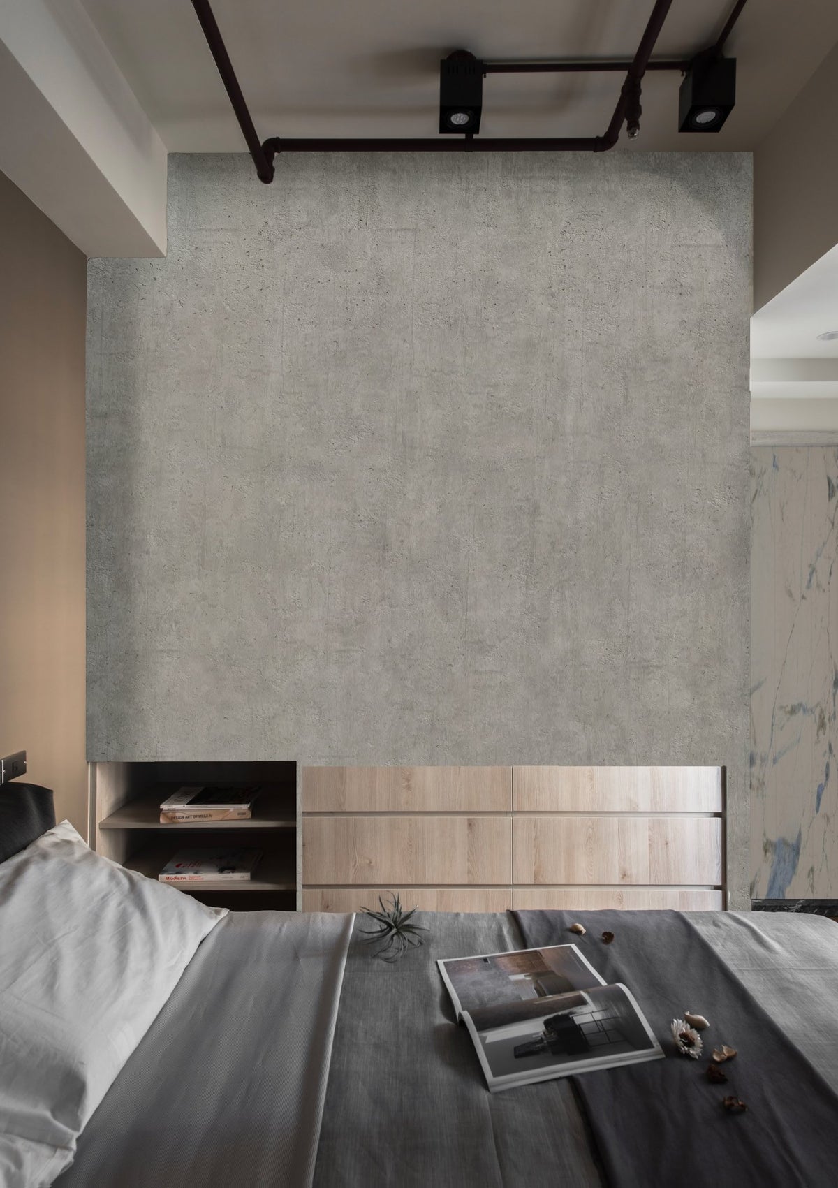 Decora Raffaello Venetian Plaster in soft grey on a bedroom feature wall